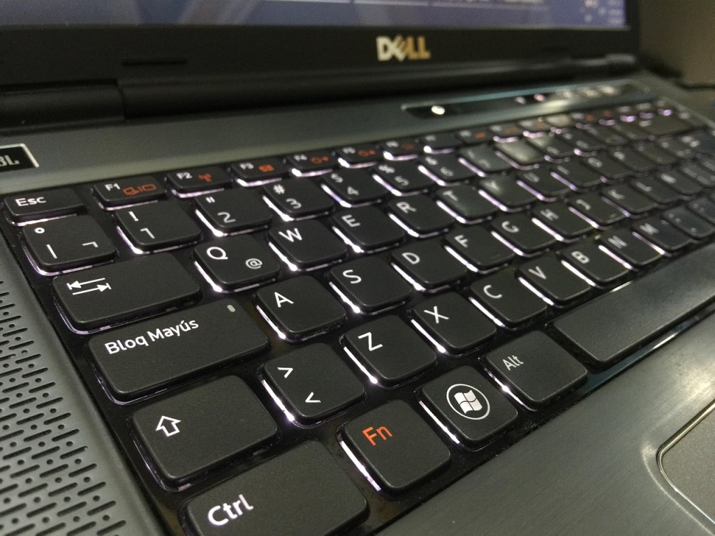 a black laptop keyboard with white lettering